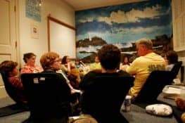 A group of children participates in a group counseling session at The WARM Place in Fort Worth, TX.