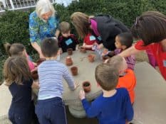 Kids and grown ups doing an activity together