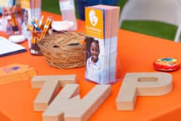 Printed materials for The WARM Place displayed on a table