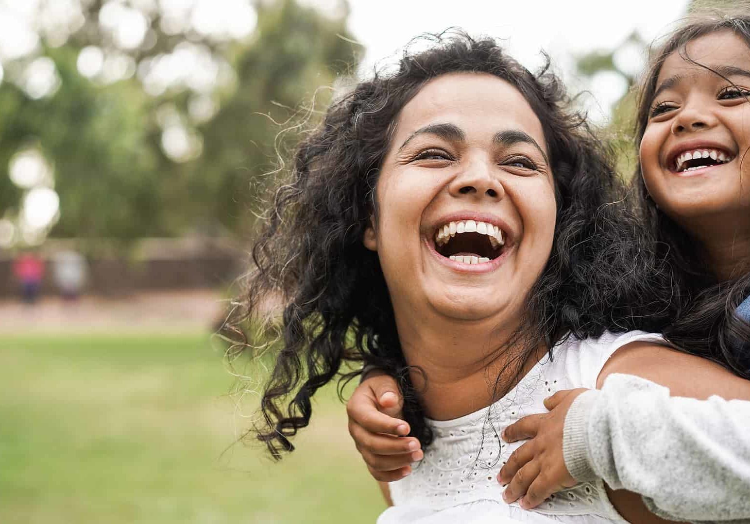 Happy,Indian,Mother,Having,Fun,With,Her,Daughter,Outdoor,-