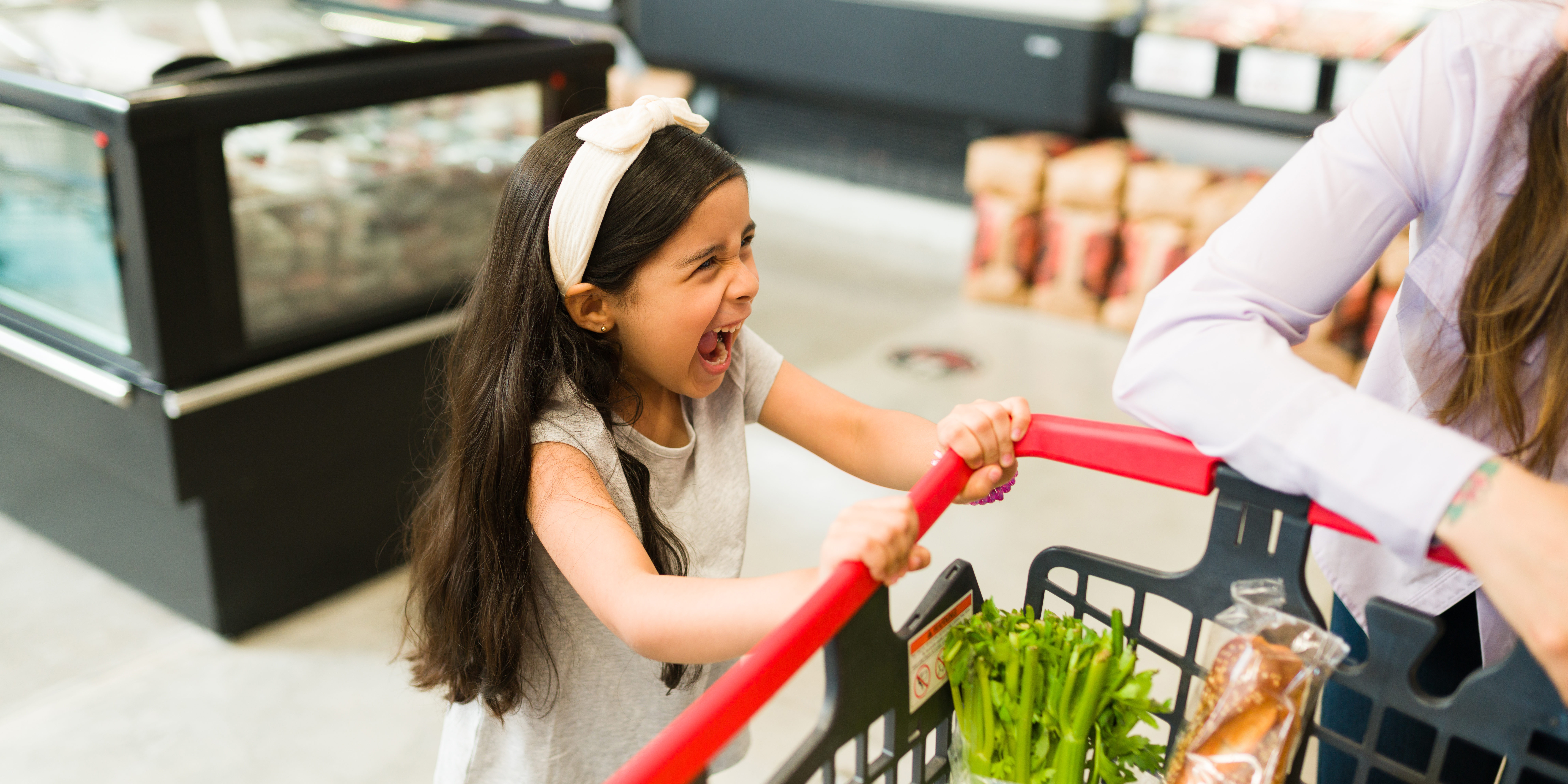 Angry,Little,Kid,Screaming,And,Throwing,A,Tantrum,While,Grocery