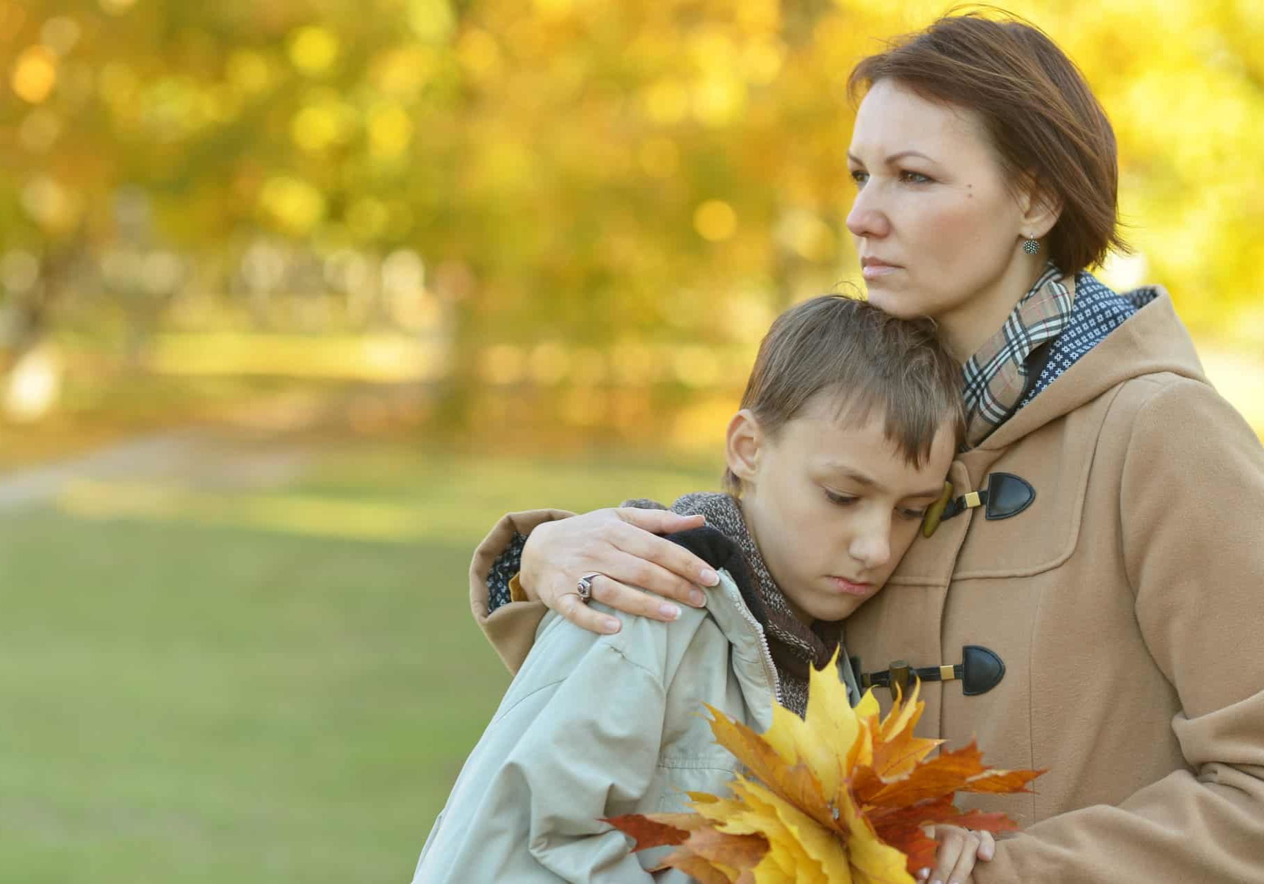 Beautiful,Mother,With,Son,In,Autumn,Park