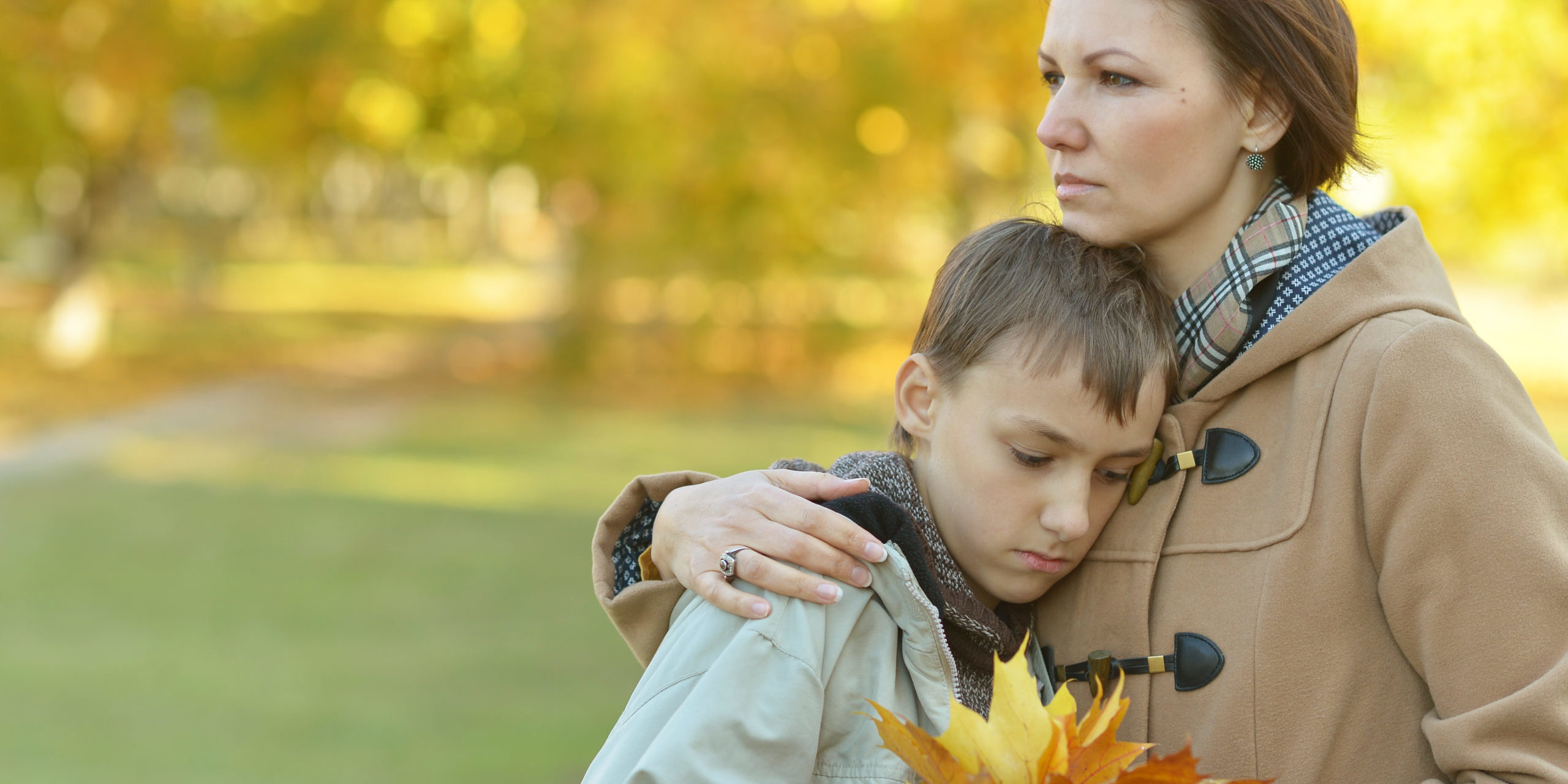 Beautiful,Mother,With,Son,In,Autumn,Park