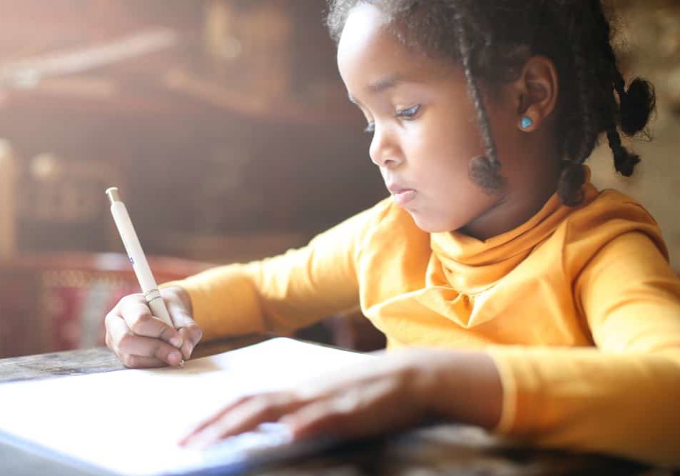 Profile,Of,Little,African,Girl,Writing,At,Home.